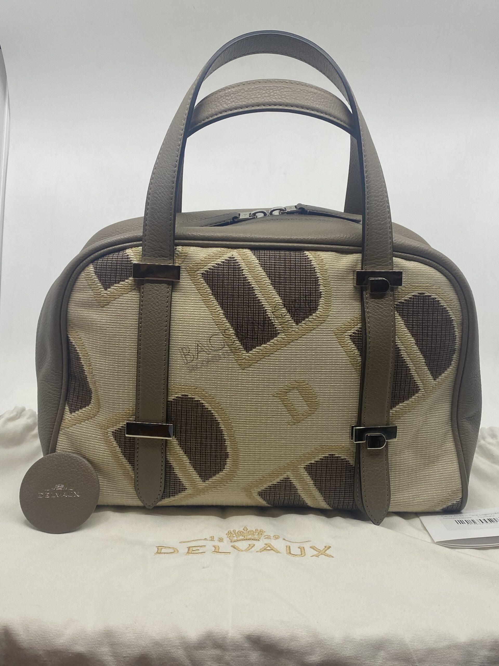 Delvaux Travelbag Carry-All mini Toile Logotypée D canvas beige en greige