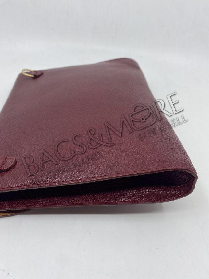 Delvaux Pochette gekorreld leder kleur bordeaux - rosso met afneembare schouderband en goudkleurige hardware