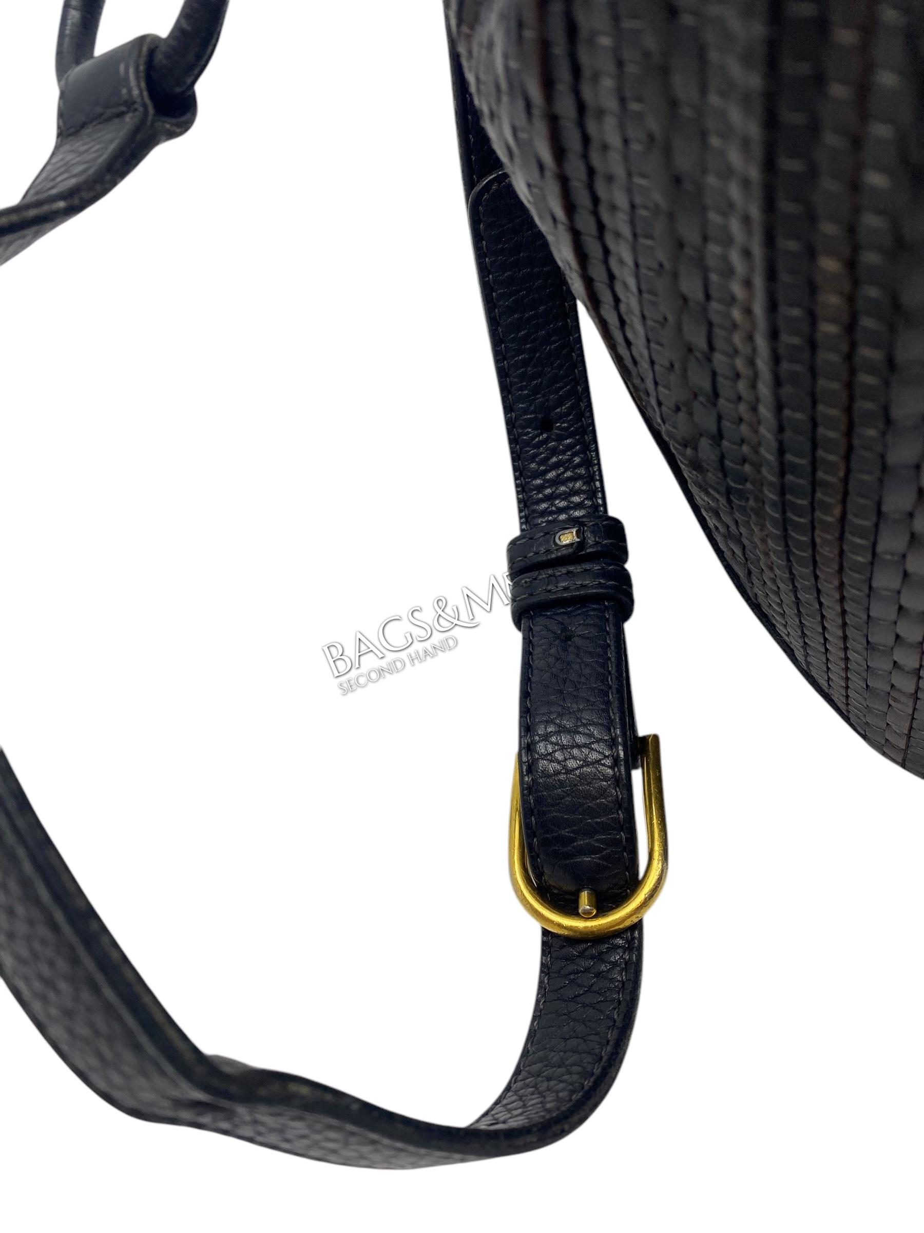 Delvaux Tabarin PM toile de cuir kleuren bruin en zwart met golden hardware